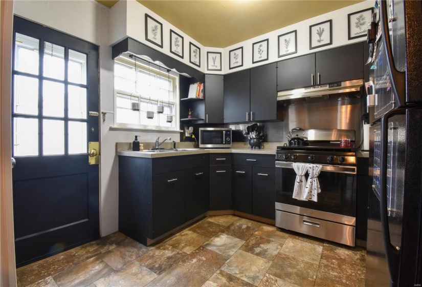 Kitchen featuring sink and stainless steel appliances