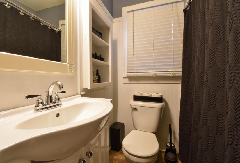 Bathroom featuring toilet and sink