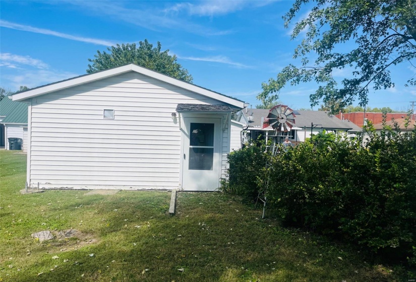 View of home's exterior featuring a lawn